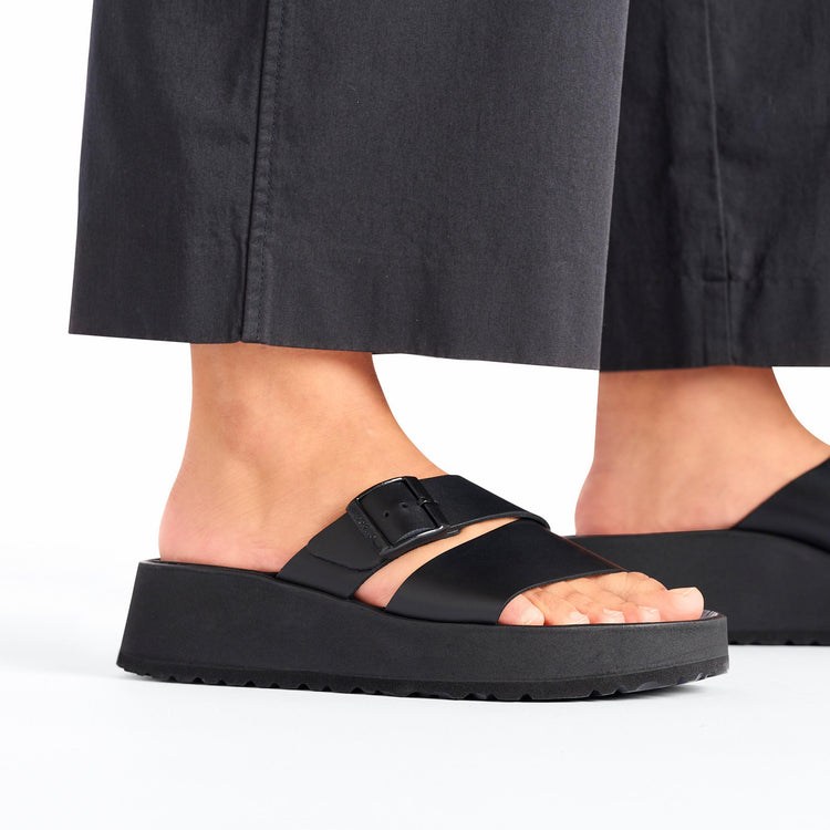 Birkenstock Almina Exquisite Platform Wedge Black Smooth Leather on model 2