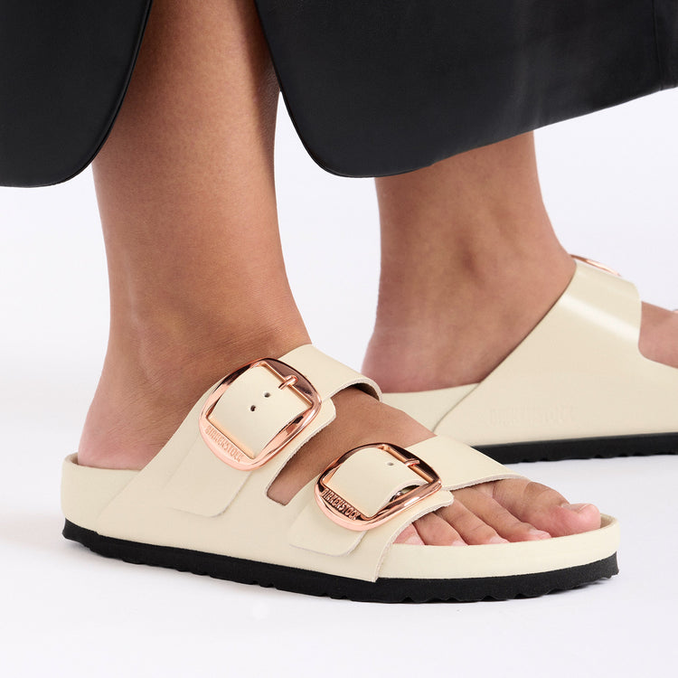 Birkenstock Arizona Big Buckle Exquisite High Shine Ecru Natural Leather Patent on model close up