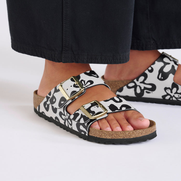 Birkenstock Arizona Blooms White Black Birko Flor on model 2