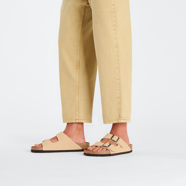 Birkenstock Arizona Desert Buck New Beige Nubuck Leather on model 1