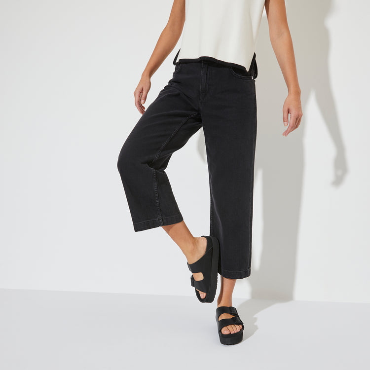 Birkenstock Arizona Exquisite Platform Black Natural Leather on model 1