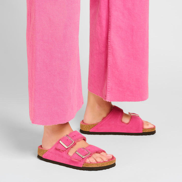 Birkenstock Arizona Shearling Fuchsia Tulip Suede Leather Shearling on model 1
