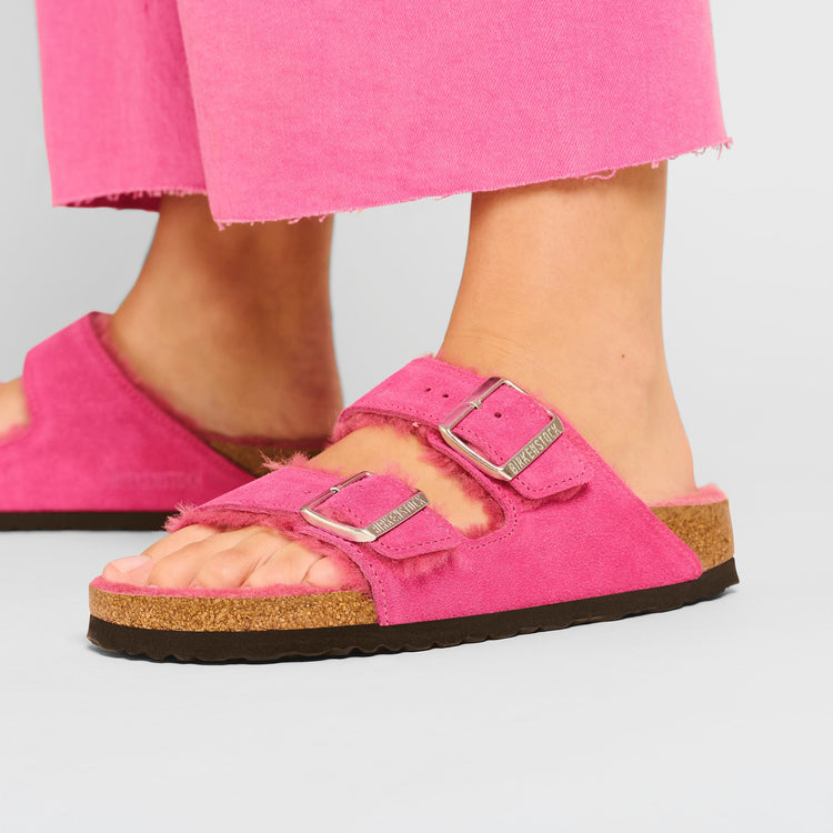 Birkenstock Arizona Shearling Fuchsia Tulip Suede Leather Shearling on model 2