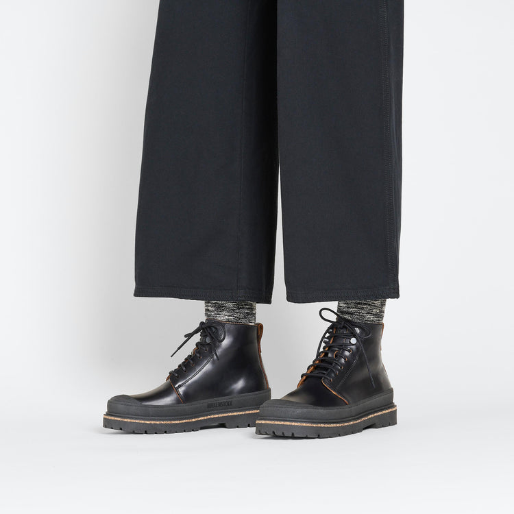 Birkenstock Prescott Womens Black Natural Leather on model 1