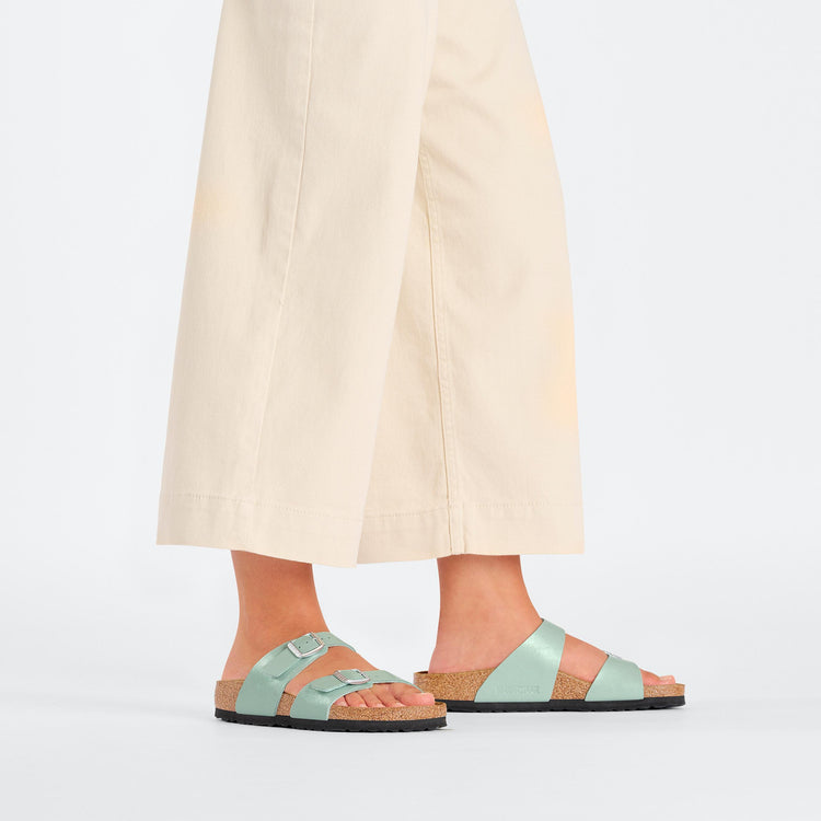Birkenstock Sydney Graceful Surf Green Birko Flor on model 1