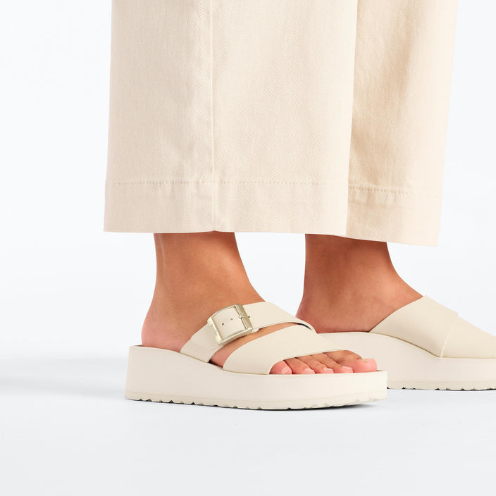 Birkenstock Almina Exquisite Platform Wedge Ecru Smooth Leather on model 2