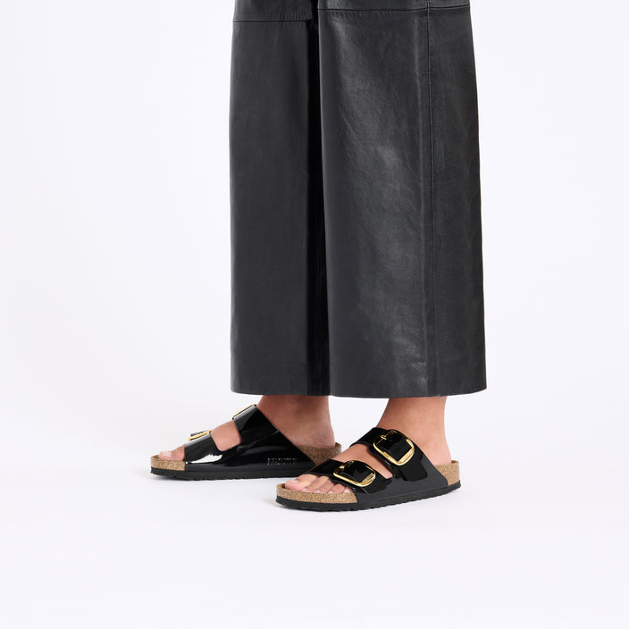 Birkenstock Arizona Big Buckle Patent Black Gold Birko Flor on model 1
