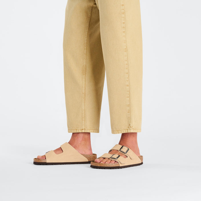 Birkenstock Arizona Desert Buck New Beige Nubuck Leather on model 1