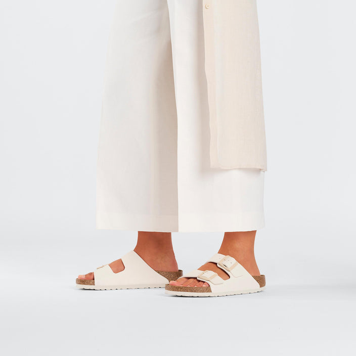 Birkenstock Arizona Eggshell Birko Flor on model 1