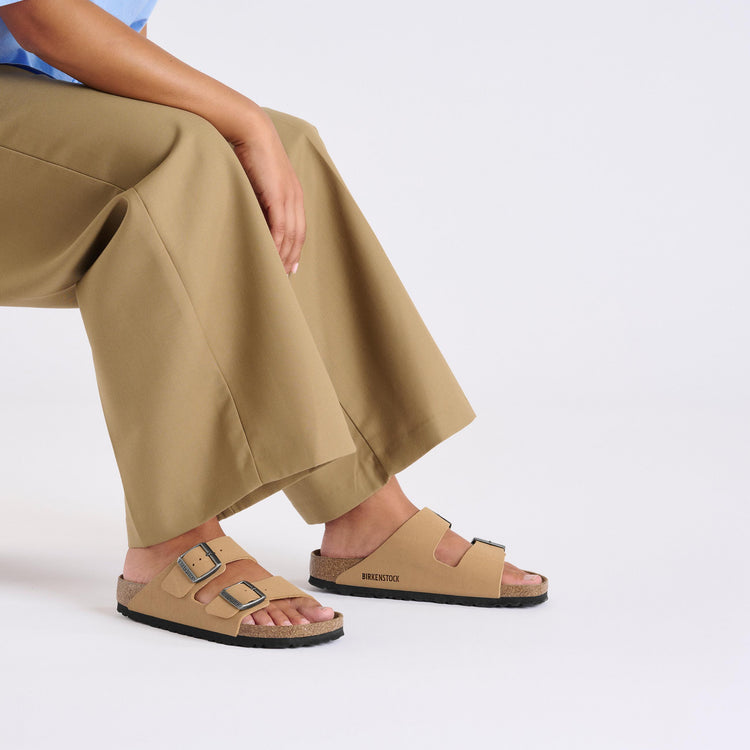 Birkenstock Arizona Latte Cream Birkibuc on model 1