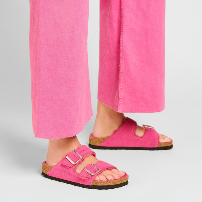 Birkenstock Arizona Shearling Fuchsia Tulip Suede Leather Shearling on model 1