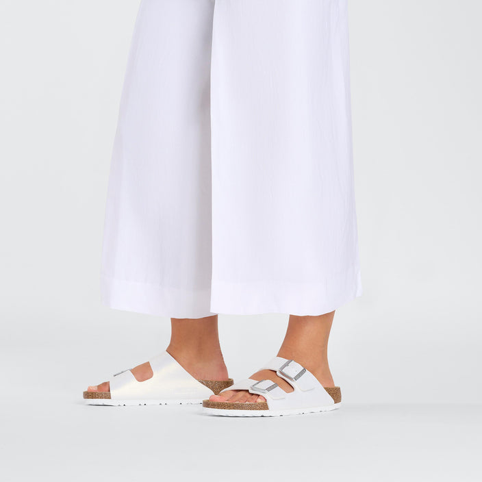 Birkenstock Arizona Shiny Embossed White Embossed Birko Flor on model 1