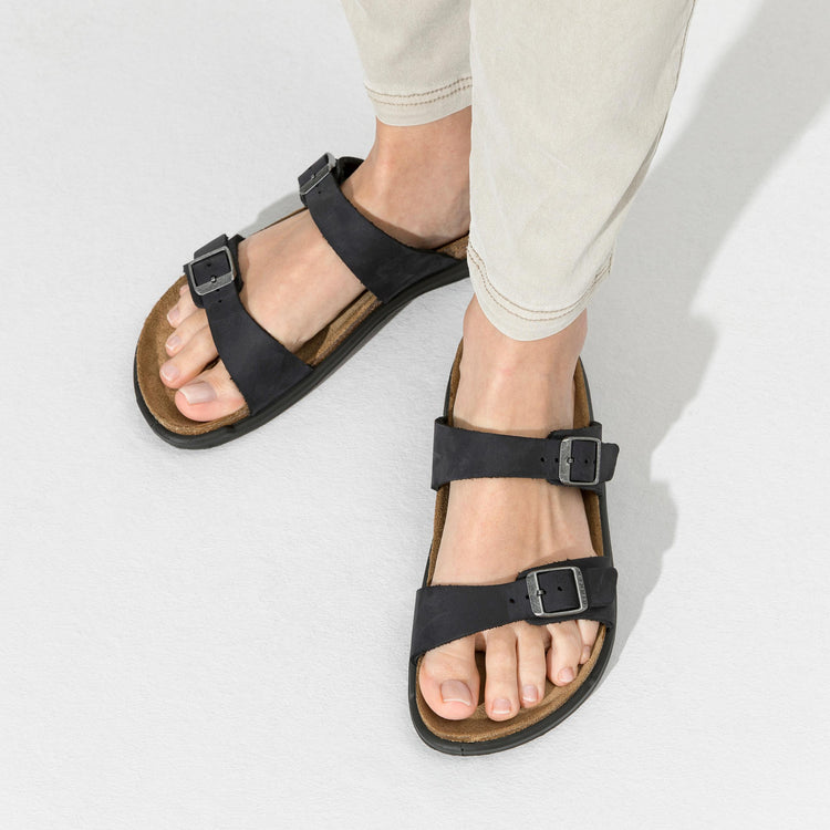 Birkenstock Sierra Cross Town Arctic Black Waxy Leather on model 2