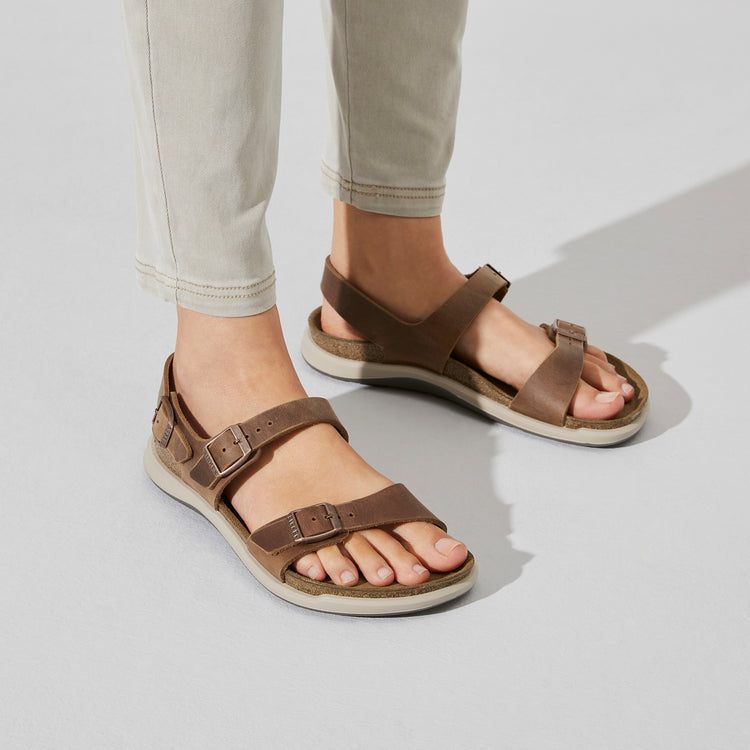 Birkenstock Sonora Cross Town Arctic Ginger Brown Waxy Leather on model 2