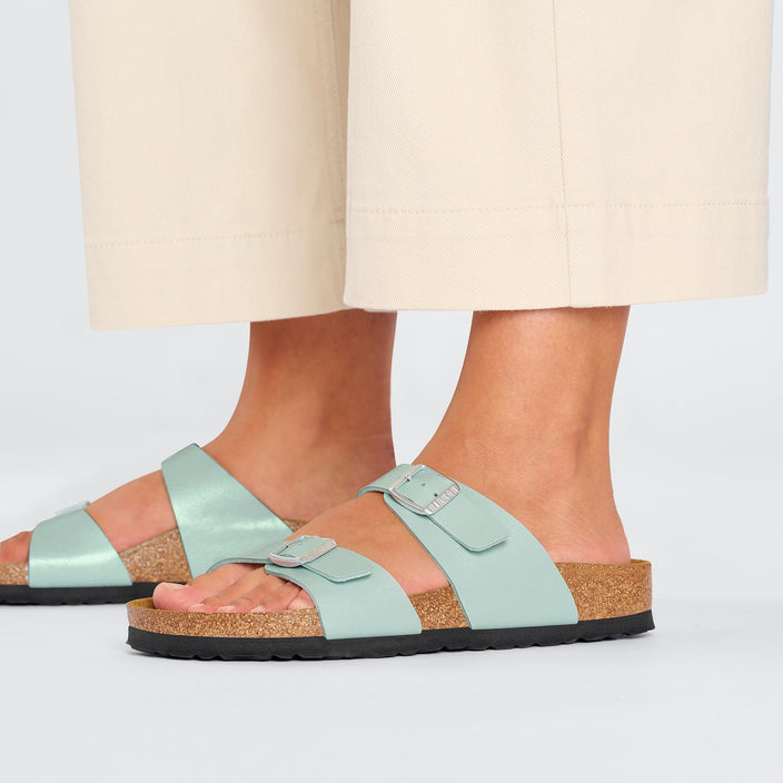 Birkenstock Sydney Graceful Surf Green Birko Flor on model 2