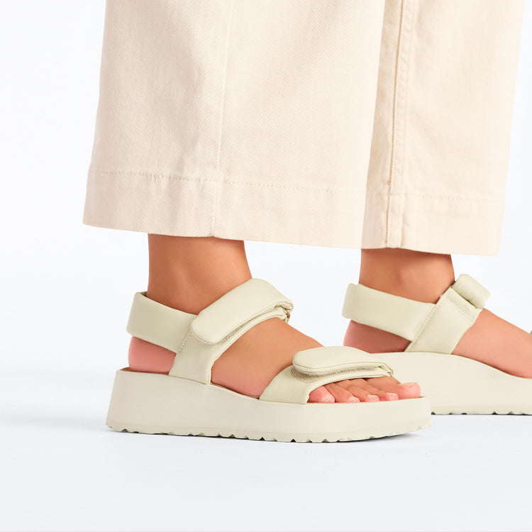 Birkenstock Theda Exquisite Platform Wedge Ecru Smooth Leather on model 2
