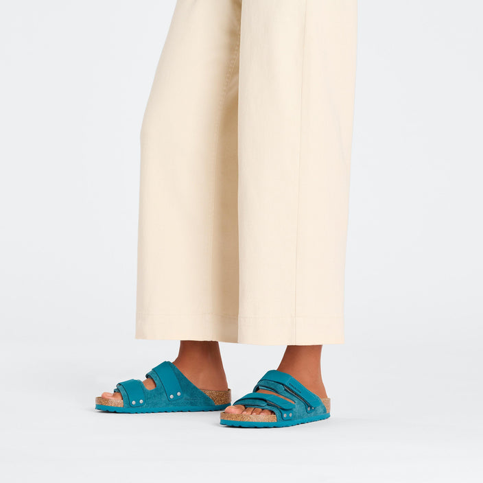 Birkenstock Uji Deep Turquoise Nubuck Suede Leather on model 1