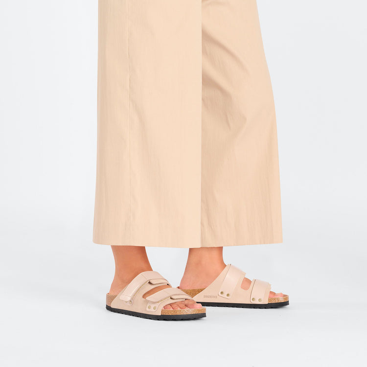 Birkenstock Uji High Shine New Beige Nubuck Leather on model 1